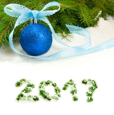 image of of blue Christmas balls in the snow close-upの写真素材