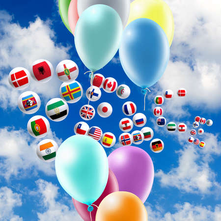 image of balloons and stylized flags in the sky close-upの写真素材