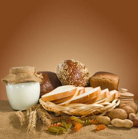 mage of bread, nuts, wheat and dairy close upの写真素材