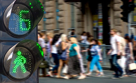 traffic light on people walking backgroundの写真素材