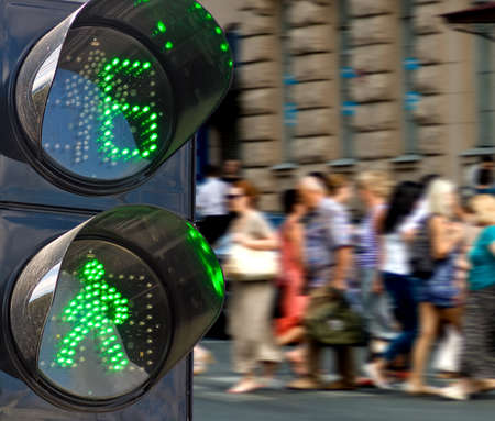 traffic light on people walking background close-upの写真素材