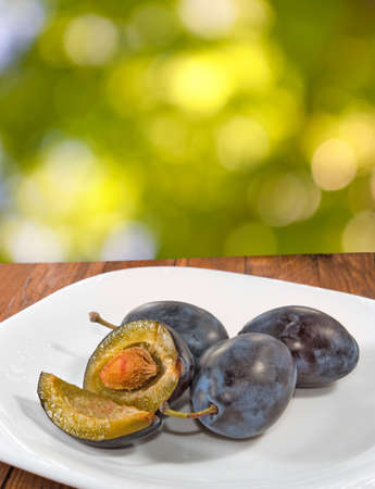 Image of  plum on the plate close upの写真素材