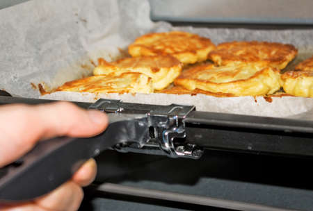 image of cheesecakes in the oven close upの写真素材