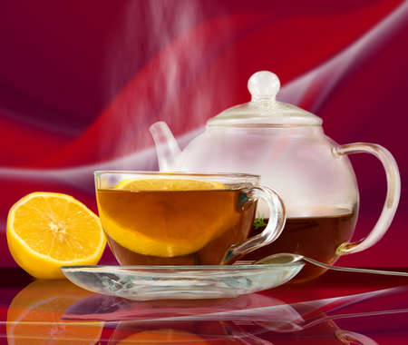 image of  cup of tea on a red background closeupの写真素材