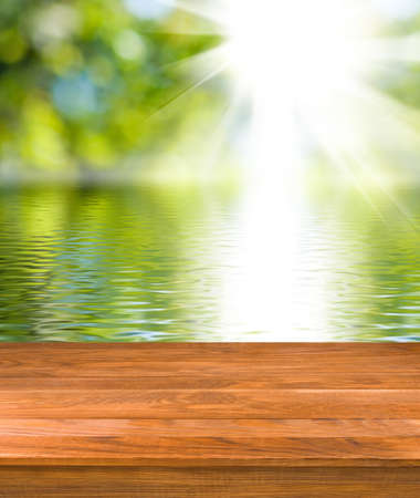 Image of wooden board on green background close-upの写真素材