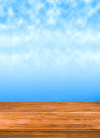 image of wooden board on a blue background closeupの写真素材