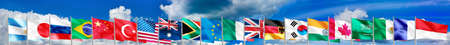 Image of different flags against the sky closeupの写真素材