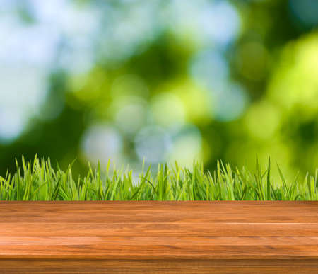 Image of wooden boards on grass background closeupの写真素材