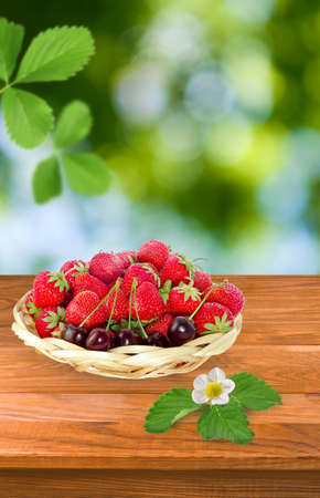 image of strawberries and cherries close-upの写真素材