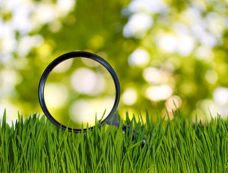 magnifying glass and grass closeupの写真素材