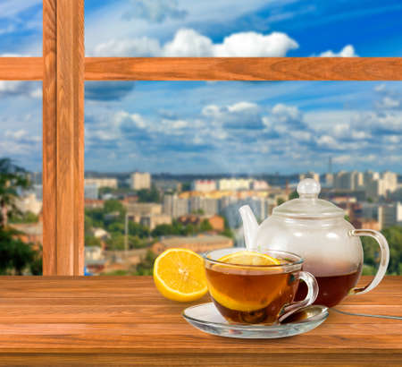 cup of tea on window background closeupの写真素材