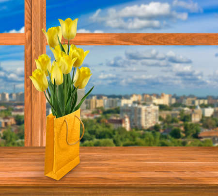 image of tulips against the windowの写真素材