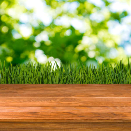 Image of wooden boards on grass background closeupの写真素材