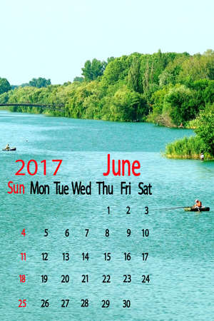 River in the rural areas. Calendar for June 2016.People in boats catching fish in the river. The hot, July day in the village.Rest of people on the riverの写真素材