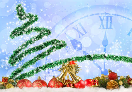 Image of Christmas tree and clock close up.
Christmas decorations,
Stylized Christmas tree and clock 
Christmas greeting card on blue background.の写真素材
