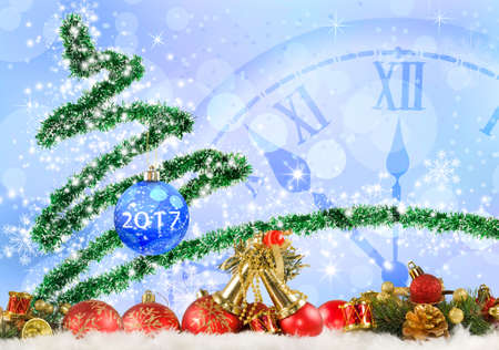 Image of Christmas tree and clock close up.
Christmas decorations,
Stylized Christmas tree and clock 
Christmas greeting card on blue background.の写真素材
