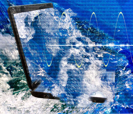 Images of laptop in water.Laptop in the water as a symbol of the bankruptcy and ruin.の写真素材