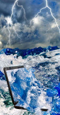 Images of laptop in water.
Laptop in the water as a symbol of the bankruptcy and ruin.の写真素材