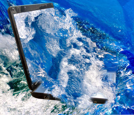 Images of laptop in water.
Laptop in the water as a symbol of the bankruptcy and ruin.の写真素材
