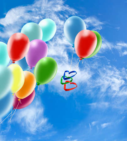 Beautiful festive balloons in the skyの写真素材