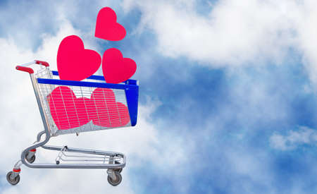 Isolated image of decorative hearts in the food trolley on a sky backgroundの写真素材