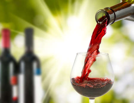 image of glasses and bottles of wine closeupの写真素材