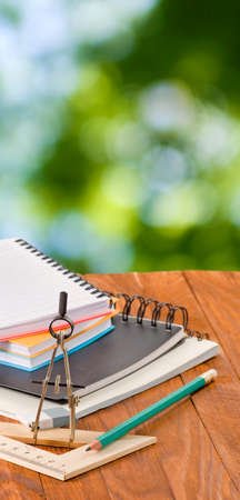 image of notebooks, ruler and pencil closeup