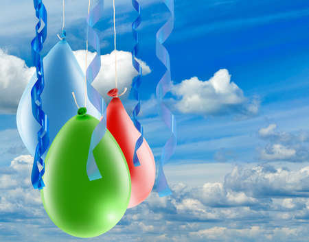image of multicolored balloon in the sky close upの写真素材