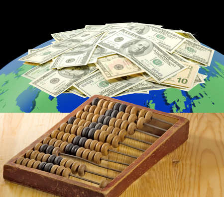 Image of wooden abacus on money backgroundの写真素材