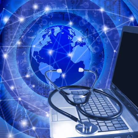 Isolated image of laptop and stethoscope closeup