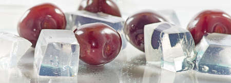 Cherries and ice cubes close upの写真素材