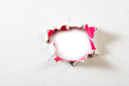 mage of hole in paper closeupの写真素材