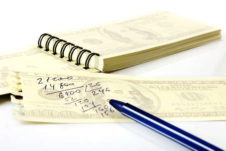 Isolated image of a notebook and pen closeup