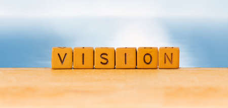 inscription of vision on blurred backgroundの写真素材