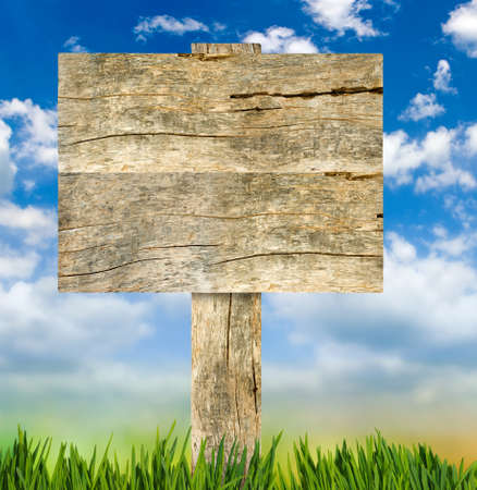  wooden pointer on sky backgroundの写真素材