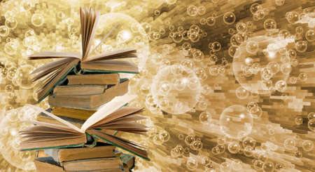 image of stack of old books on abstract backgroundの写真素材