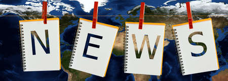 sign news on notebooks on black background against earth background 