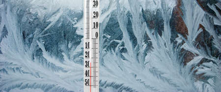 thermometer on frosty window