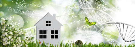 3d-image of a stylized house on the background of a natural landscapeの写真素材