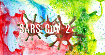 3d image of stylized sars-cov-2 viruses with an inscription on a colorful abstract backgroundの写真素材