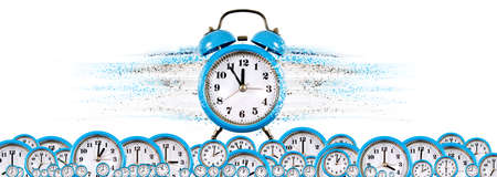 An abstract image of a clock that breaks into small particles. The fleetingness of time and the...