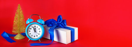 Image of New Year's toys close-up on a red background.の写真素材