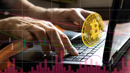 The image of hands on the keyboard keys combined with a stylized image of bitcoin