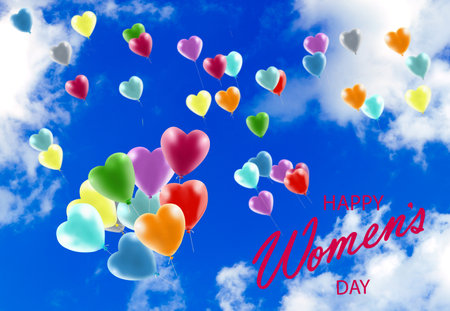 Happy Women's Day greeting card. Women's day greeting card with balloons and hand drawn calligraphyの写真素材