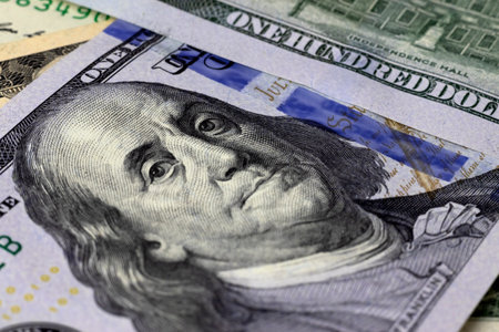 Image of hundred dollar bills lying in a mess