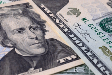 Image of twenty dollar bills lying in a messの写真素材