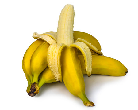 A cluster of ripe yellow bananas sits invitingly, showing their bright, glossy skins.の写真素材