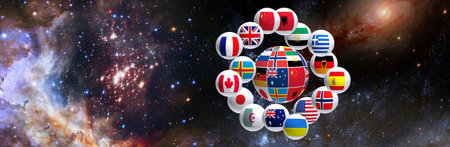 Various national flags are arranged around a globe, showing different countries and cultures. The backdrop features a colorful cosmic scene filled with stars and galaxies.の写真素材