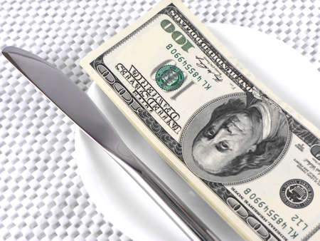 dollars money on plate with knife