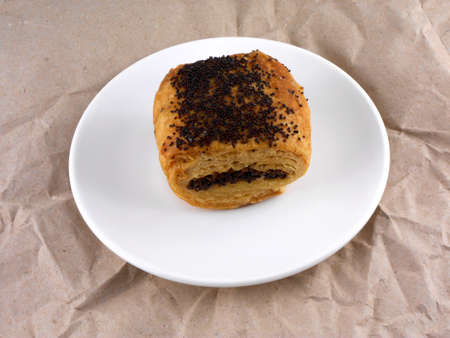 sweet poppy seed cake on white plate